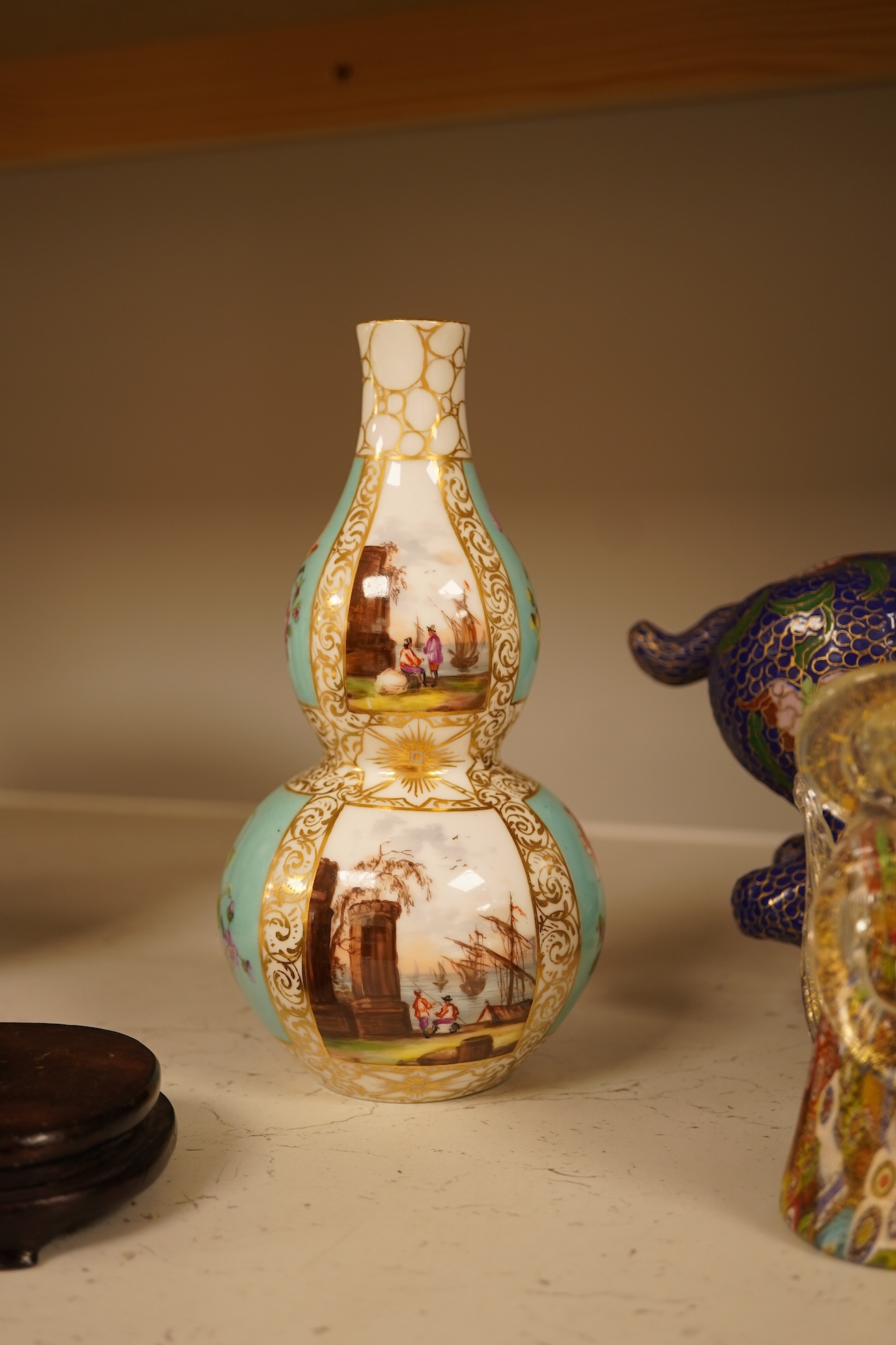 A Chinese cloisonné enamel horse and vase, two miniature Rockingham floral teapots, a malachite box etc (9). Cloisonné horse 20cm long.